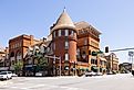 The Americus Historic District, Georgia with cars on the street and the water tower in the distance. Image credit Roberto Galan via Shutterstock
