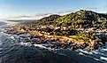 Yachats town on the rugged Oregon coast during a beautiful sunset.