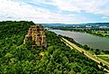 Sugar Loaf Bluff and the highway and lake in Winona, Minnesota during the summer.