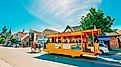 Horse driven cab in Solvang, picturesque small town in Santa Barbara County, California. Popular touristic attraction, street view