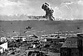 Liberty Ship SS Rowan explodes after being hit by a German bomb, near Gela, Sicily on July 11, 1943.