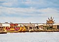 Uros Floating Islands, Lake Titicaca, Puno Region, Peru. Via Shutterstock / Karol Kozlowski.