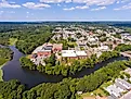 Cumberland historic town center aerial view on Broad Street with Blackstone River in town center of Cumberland, Rhode Island RI, USA. Wangkun Jia via Shutterstock