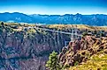 Royal gorge canyon and the associate suspension bridge draw tourists to Colorado. 