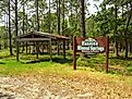 Panacea Mineral Springs in Panacea, Florida, featuring a small pavilion with a gabled roof sheltering the historic spring