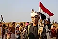 Local tribes mobilized to support government forces in northwest Yemen carry the nation's flag. Editorial credit: Mohammed al-wafi / Shutterstock.com