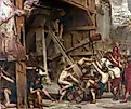 Depiction of Roman soldiers manning a catapult for the attack on Carthage. By Edward Poynter, Public Domain, Wikimedia Commons.