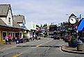 Downtown Poulsbo, Washington Front Street with clock in summer. Image credit Ian Dewar Photography via Shutterstock