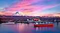 Mt Rainier, Ships and The Port Of Tacoma. Puget Sound, Washington, USA. Image: Tobin Akehurst - Shutterstock. 