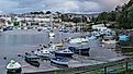 Boats lined up in Caernarfon Harbour on the North Wales coastline. Editorial credit: Jason Wells / Shutterstock.com