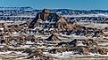 The rock formations and snowy landscapes of Badlands National Park in South Dakota.