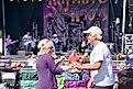 Seniors dancing at an outdoor music festival in Charlestown, Rhode Island. Image credit Carol Ann Mossa via Shutterstock