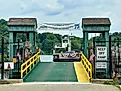 reen gate for Chester-Hadlyme Ferry with boat heading off to the other shore. Second oldest ferry in continuous use in CT. Editorial credit: Rachel Rose Boucher / Shutterstock.com 