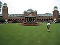 The putting green in front of the Medinah Country Club clubhouse. Via Wikimedia Commons, Dan Perry, CC BY 2.0.