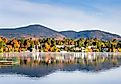 View of the Mountain Village of Lake Placid from a Foggy Mirror Lake at Sunrise