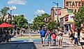 Busy Front Street in downtown Traverse City, Michigan. with State Street Theater. Editorial credit: Heidi Besen / Shutterstock.com