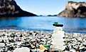 The bits of sea glass now giving Glass Beach its name have been largely smoothed out over time as a result of oceanic activity, allowing them to be touched and even turned into new pieces of art.