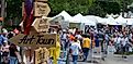 SPRINGFIELD, MISSOURI USA-MAY 7 2005 A sign points the way to "Art Town" during Arts Fest on historic Walnut Street, Springfield, MO. Artists sell their work. Editorial Credit: OzarkStockPhotography.com Via Shutterstock.