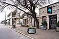 Street scene from hill country town, Fredericksburg Texas with historic buildings in view. 