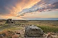 Sunset over sandstone rock formations and prairie of Medicine Rocks State Park.
