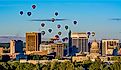 Capital and skyline of Boise Idaho with balloons in flight