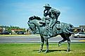 Cowboy statue in Lander, Wyoming. Image: Fsendek / Shutterstock. 