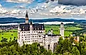 Neuschwanstein Castle near Füssen in Bavaria, Germany, overlooking the village of Hohenschwangau in the Bavarian Alps