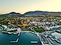 Aerial view of Bar Harbor Maine with the Acadia National Park in the background