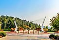 A big iron sculpture along the Couer d'Alene Lake and forest in Idaho
