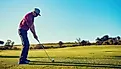 Golfer getting ready for his shot.