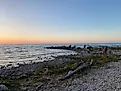 Campers enjoying a pastel sunset from MacGregor Point’s wild Lake Huron beach. CREDIT: Andrew Douglas