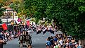 Crowds gather to see the annual Maldon Easter Procession in Maldon, Victoria, Australia. Image credit: lurchman / Shutterstock.com.