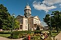 Madison County Courthouse in Winterset, Iowa. By Teddi Yaeger, CC BY-SA 4.0, Wikimedia Commons.