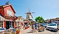 Main street, street view, and tourists in Solvang, beautiful small town in California. Editorial credit: HannaTor / Shutterstock.com