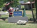 Sign welcoming visitors to Santa Claus, Indiana. Image credit: Doug Kerr via Flickr.com.