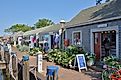 Traditional New England buildings and stores on Nantucket Island in Massachusetts, via EQRoy / Shutterstock.com