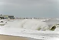 Rough seas, rip currents and high winds caused by Hurricane Erin batter and flood Cape May's iconic Atlantic coast beaches, Editorial credit: George Wirt / Shutterstock.com
