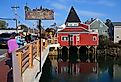People and buildings in Kennebunkport, Maine. Image credit EQRoy via Shutterstock