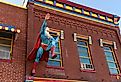 Statue of Superman flying outside the Super Museum in Metropolis, Illinois. Image credit Gino Santa Maria via Shutterstock.