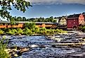 The River Walk Covered Bridge on the Ammonoosuc River in Littleton, New Hampshire.