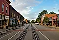 A mainline CSX train track runs down the middle of Main Street in historic La Grange, Kentucky. Editorial credit: BD Images / Shutterstock.com