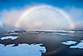 A white rainbow, a rare meteorological phenomenon, over the East Siberian Sea. 