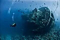 Divers exploring the shipwreck in the Jordan Red Sea. 