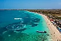High angle aerial view of the crowded Playa Blanca beach on Baru Island near Cartagena, Colombia