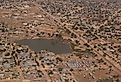 Aerial view to NDjamena and Chari River, Chad. Image credit homocosmicos via Adobe Stock. 