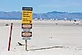 A warning sign in White Sands National Park keeping hikers away from a missile test range in New Mexico.