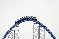 The train of Millennium Force crests a hill at Cedar Point in Sandusky, Ohio. Via Shutterstock / CJDPhotos
