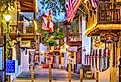 Shops and inns line St. George St in St. Augustine. Once the main street, it is still considered the heart of the city. Image credit: Sean Pavone via Shutterstock.