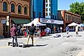 Four young men playing cornhole or corn toss in Elkin, North Carolina. Image credit:  J. Michael Jones / Shutterstock.com.
