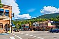 The historic buildings with businesses, shops and cafes along Baker Street in the town center of Nelson, BC, Canada.